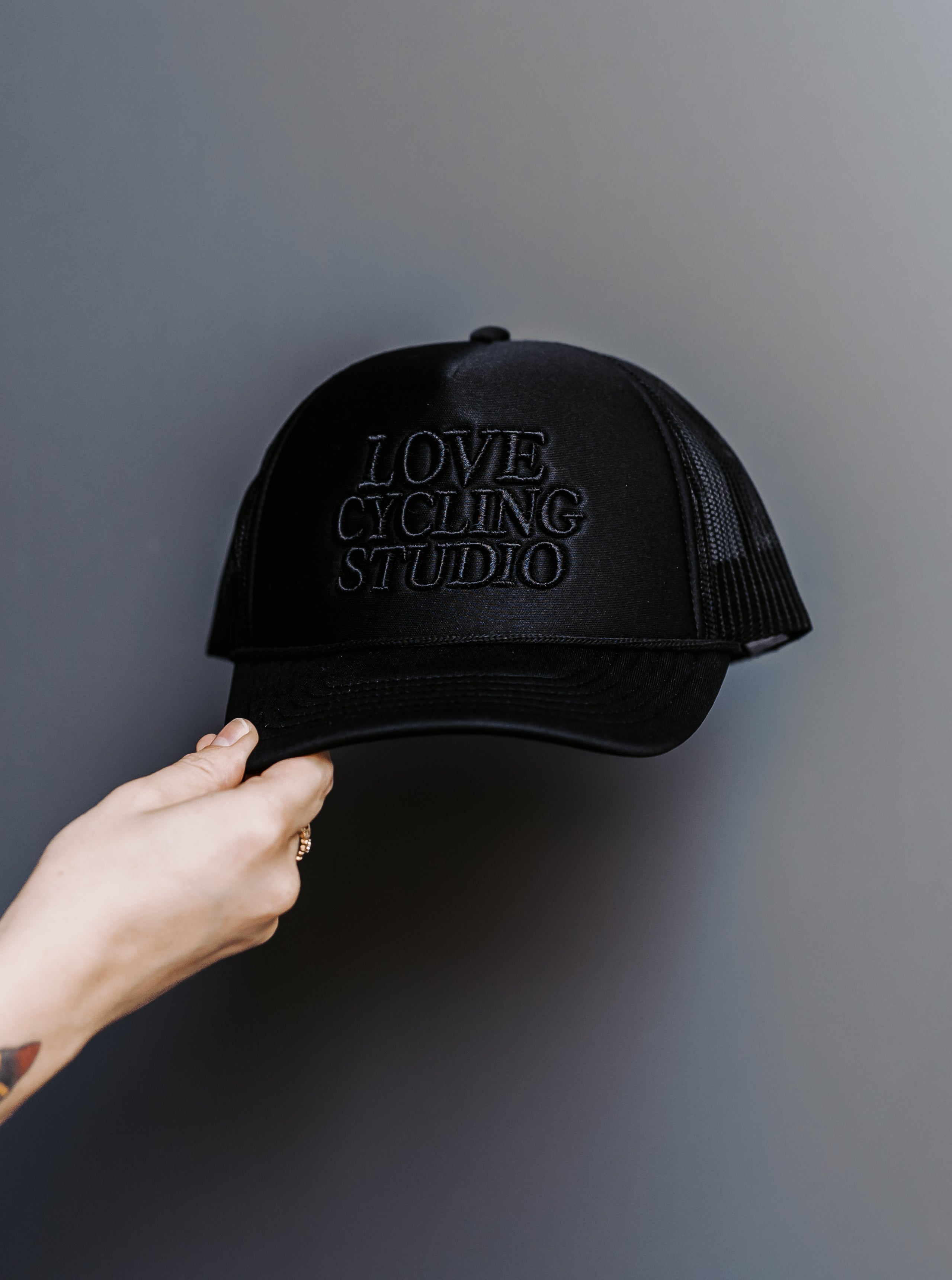 LOVE Cycling Studio Monochromatic Trucker